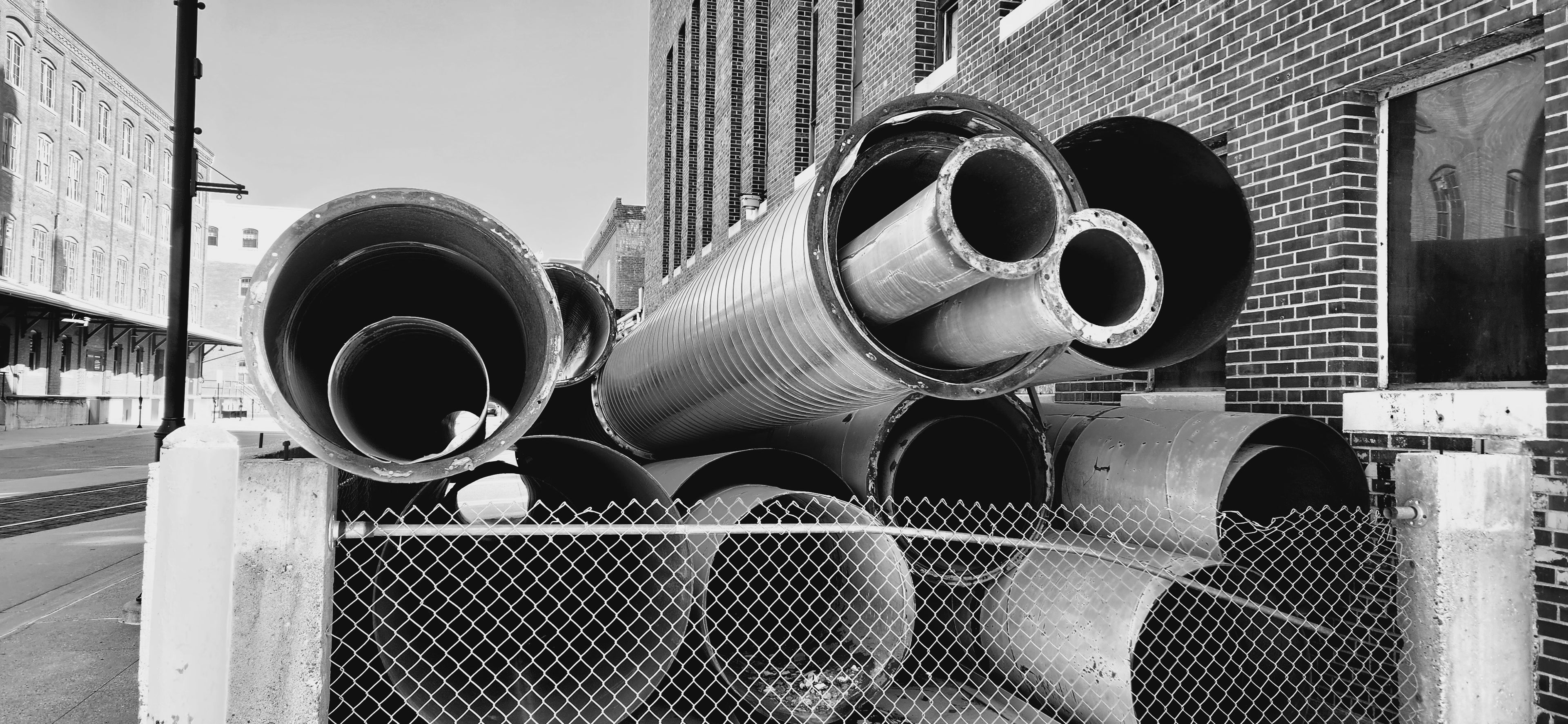 Black and white pipes street side